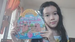 baby cathy membuka dan menempel di kertas capybara