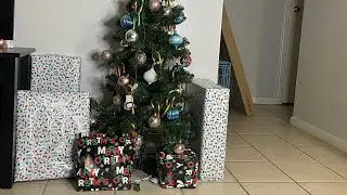 Wrapping Christmas presents and decorating gingerbread cookies