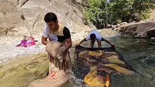 Chavil family picnic by the river and washing blankets