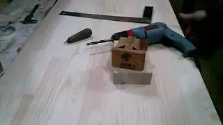 Jig for perpendicular drilling.