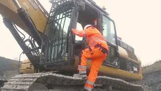 12. Safe egress from an excavator from a rock pile