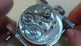 Checking out pocket watch, Waltham