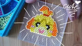 Playing with an Animal Crossing Aquabeads kit