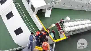 Video of captain leaping from sinking South Korean ferry, leaving students to die