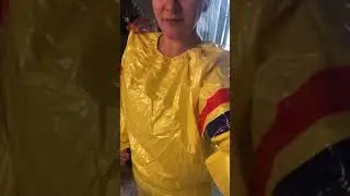 Girl inflating her plastic suit