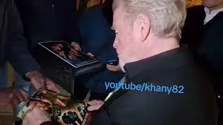 Ridley Scott signing autographs during Napoleon London Premiere