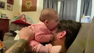 4 month old teething daughter attacks my face.