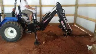 Using the wood Max backhoe