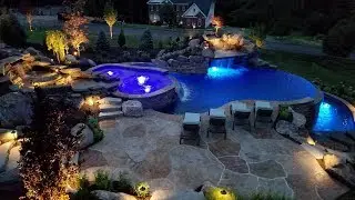 Infinity Edge Pool with Sun Ledge, Grotto, Waterfall & Floating Steps