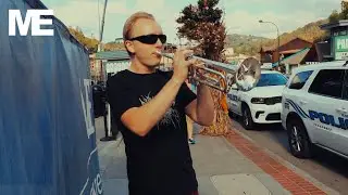 PLAYING A TRUMPET ON THE STREET