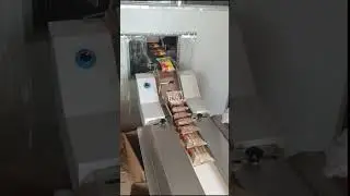 Automatic biscuit stacking machine, Stacking of packed biscuit Machine, Packet sorting machine