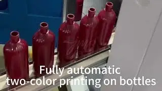 Fully automatic two color printing on bottles #screenprinter #screenprintingmachine #hotstamping