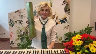 Пісенька про дощик та музичний інструмент Рейнстік.