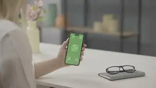 Free iPhone 14 pro Green screen footage 4k _ a business woman holding using iPhone blank screen