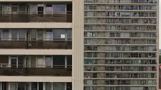 Terraces of a Brussels residential skyscraper, revealed from an aerial point of view Vibrant urban