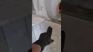 Installing A Corner Shelf In A Shower