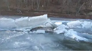 Dangerous road to the dugout. The motorcycle went under the ice.