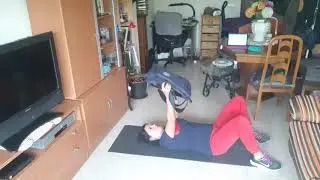 Tonificacion con mochila en suelo