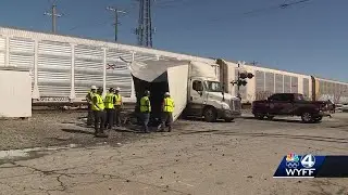 Video shows train slamming into tractor-trailer stopped on South Carolina railroad tracks