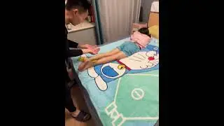 Post-Competition Parenting: Dad's Leg Massage for Daughter's Relaxation & Growth