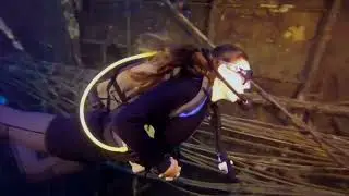 Female diver is Diving with tight neoprene Wetsuit