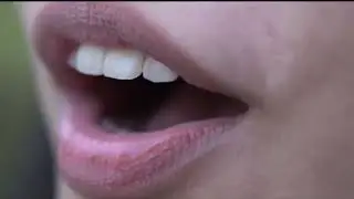 Close Up Mouth Talking Young Woman 