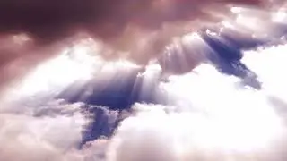 Clouds Pass By While Sun Sets Against a Heavenly Purple Sky Timelapse Stock Footage [4K]