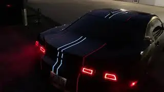 Chevy Camaro with lumilor painted racing stripes applied to vinyl