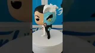 Funko Pop - Two Face from Batman animated series.