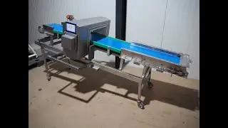 1247-29 Safeline metal detector with elevating belt