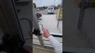 Bringing an emergency exit into code compliance with Detex alarmed exit hardware.