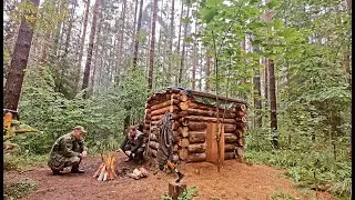 HUT IN THE TAIGA. WHO HAS BEEN IN THE HUT? PREPARING FIREWOOD FOR THE WINTER. COOKING FOOD OVER T...