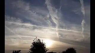 WHAT A BEAUTIFUL SUNSET ( NOT , ALL FROM PLANES SPRAYING.