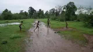 Kids sliding in the mud at Sudhagad Trek
