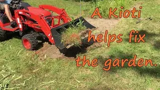 A Kioti CS2520 helps fix the garden.