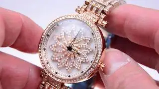 Женские часы с вращающимся циферблатом