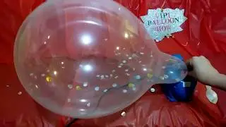 Slow motion balloon pop! Pump to pop clear gold confetti filled balloons