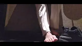 shoes off in a public bathroom, foot fetishism