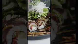 Sushi Being Displayed On Plate