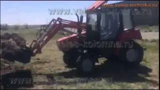 Погрузчик Универсал-400 на МТЗ-320 в работе