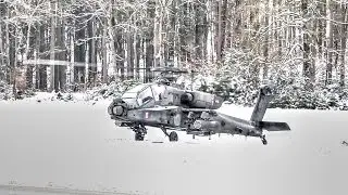 US Army AH-64 Helicopters Take Off in Snow