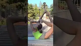 Yoga and stretching on the street with passers-by. Yoga every day!