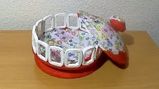 Bombonera con tubitos de papel periodico