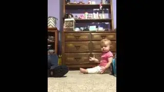 11 month old playing catch