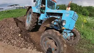 The tractor is slipping. A small tractor with a huge power.