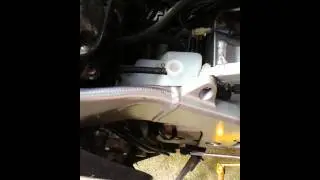How to change motorcycle coolant reservoir tank