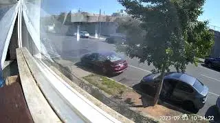 Litter person throws plastic bottle from car