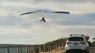 Hangliding above the footpath in Cottesloe, Perth, Western Australia