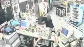 Violent Robbery Caught on Surveillance Camera.wmv