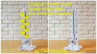 Marble machine with the image of Pac-Man.